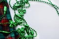 St. Patrick's Day beads & tartan ready for fun Royalty Free Stock Photo